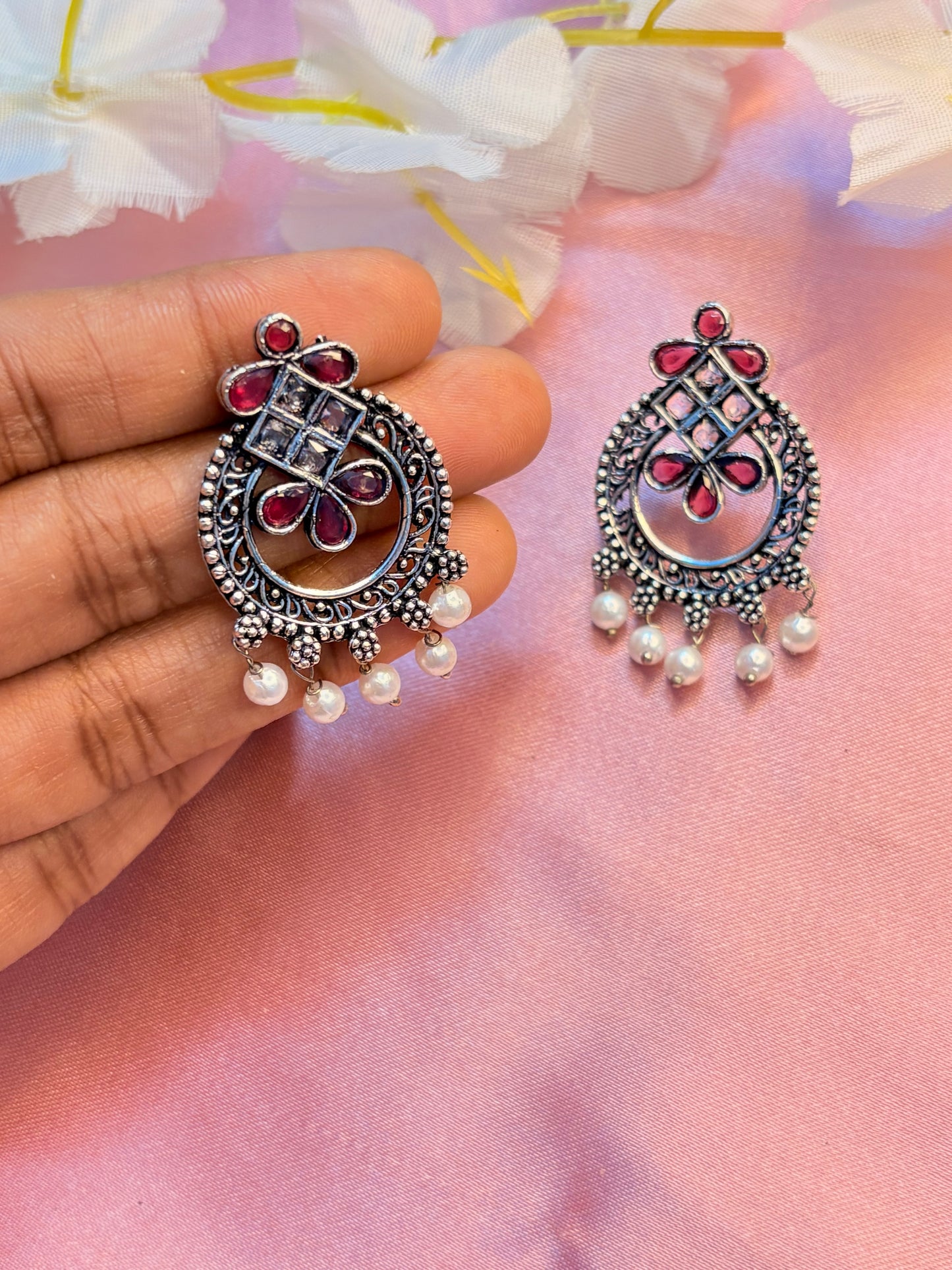 earrings with red gemstones and pearls