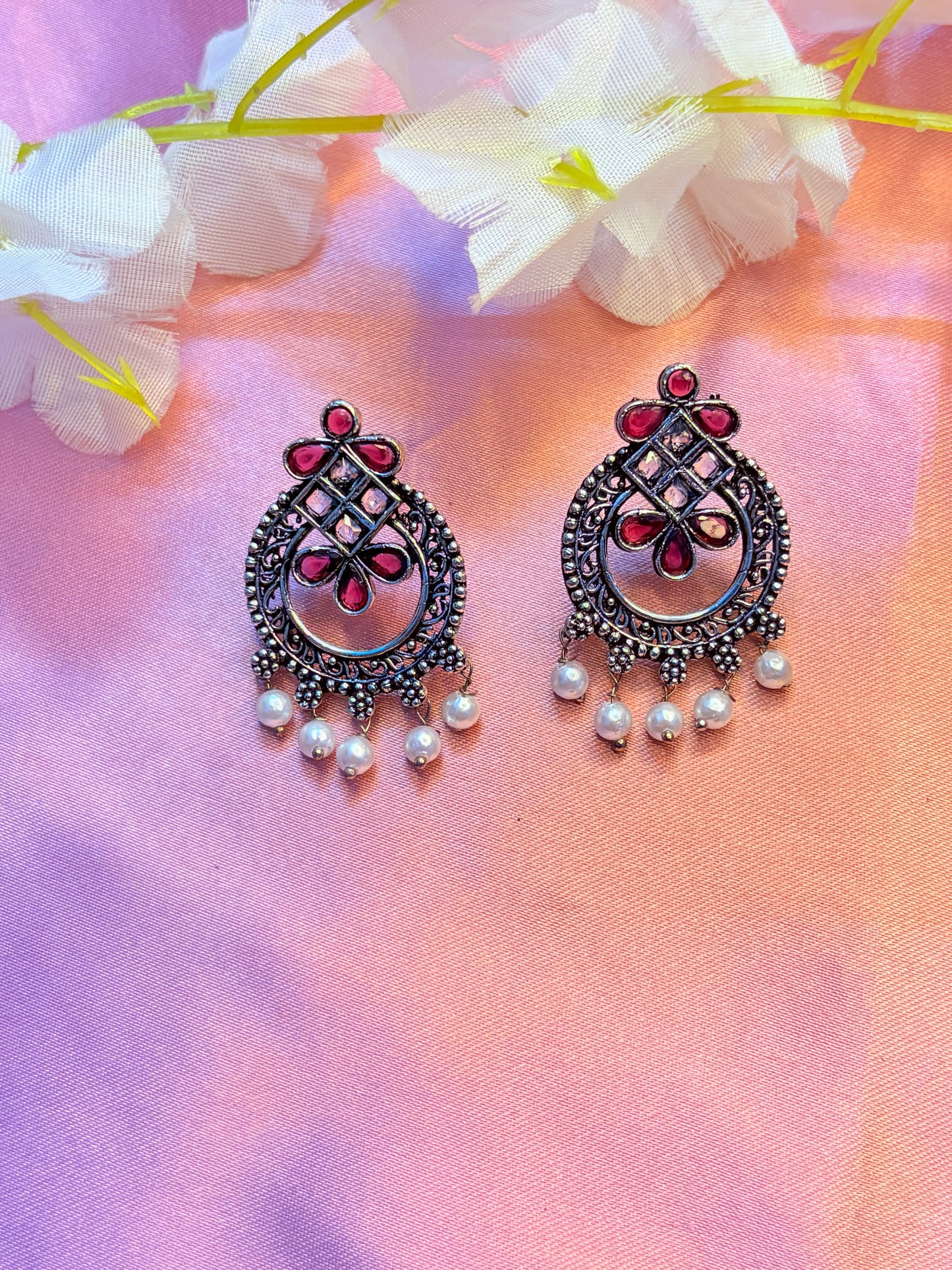 earrings with red gemstones and pearls