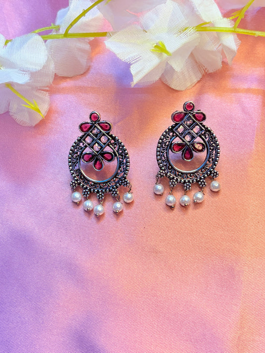 earrings with red gemstones and pearls